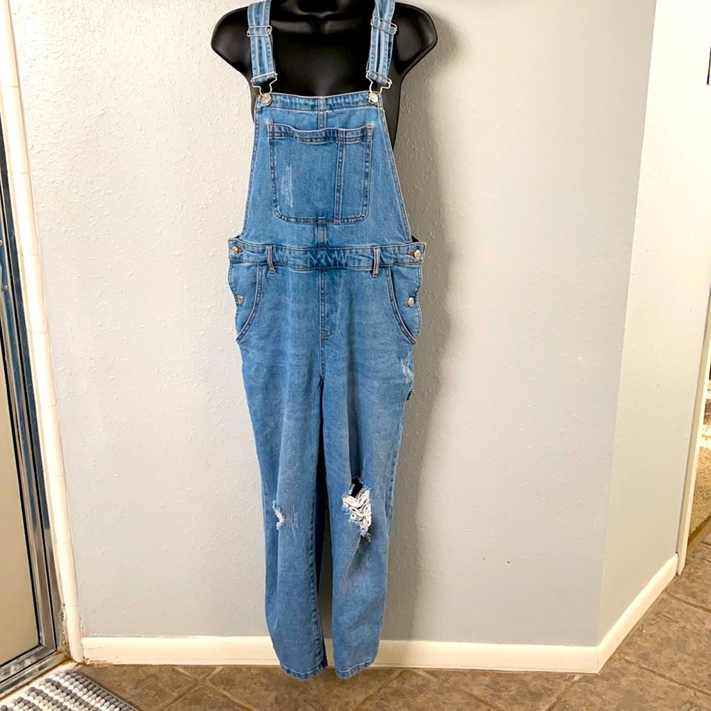 Distressed denim overalls